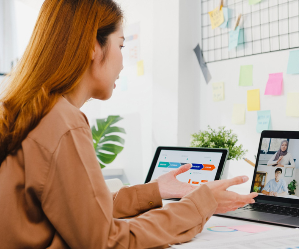 Medical Virtual Assistant working on a laptop in a healthcare setting.